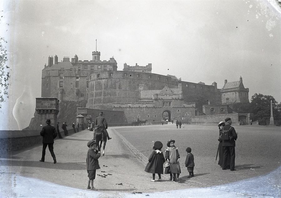 Edinburgh Castle. Notice the child with no shoes, a common sight in Victorian times.