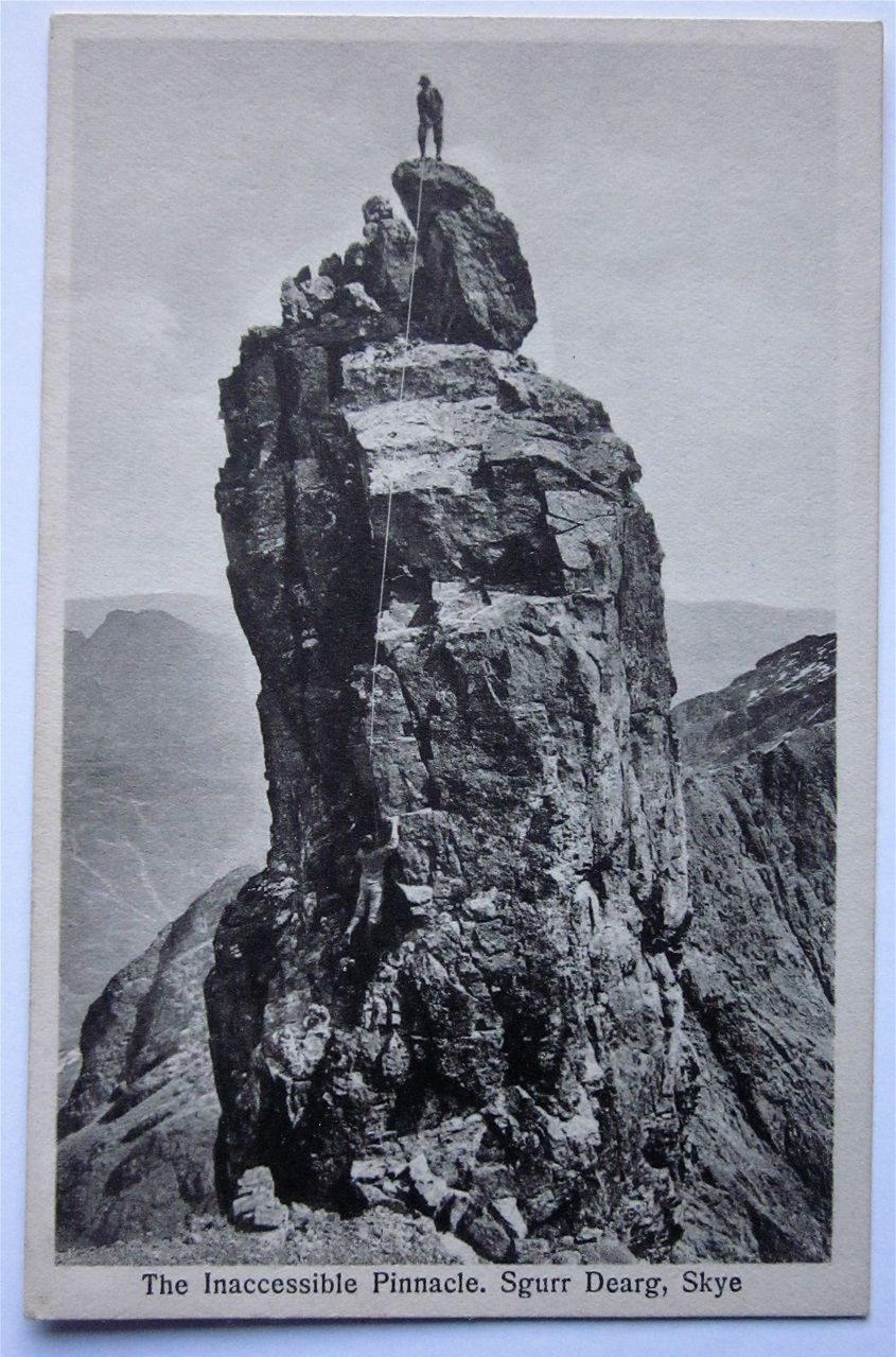 The Inaccessible Pinnacle, Skye. A figure can just be made out at the bottom of the rope.