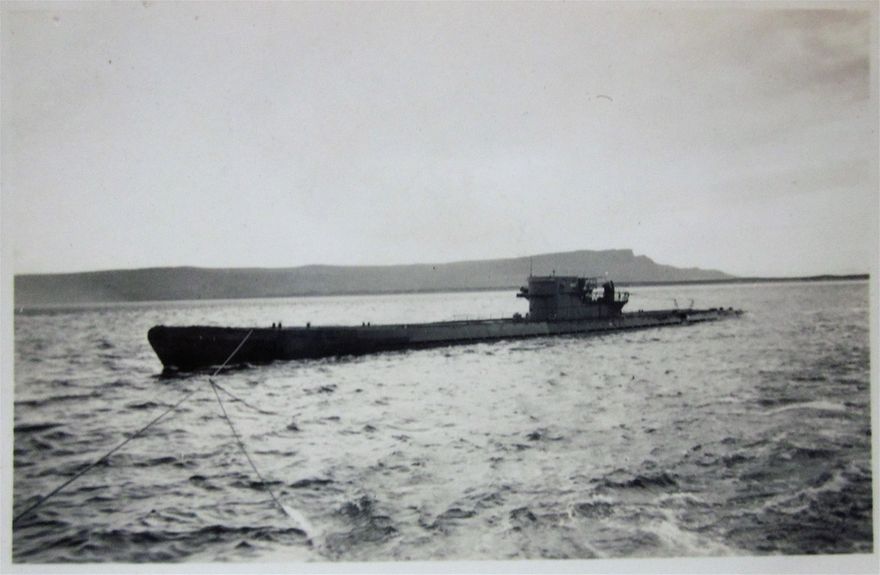 This is clearly Whiten Head in the background. Is the U-boat being towed away?